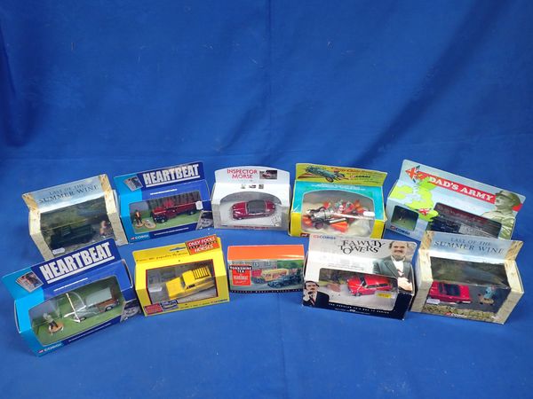 A COLLECTION OF BOXED MODEL VEHICLES