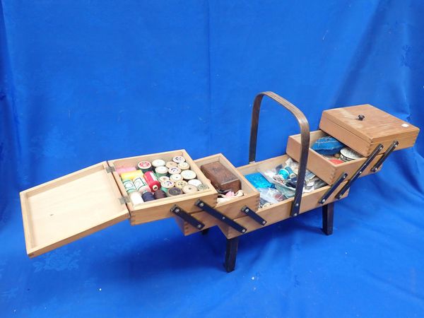 A FOLDING COMPARTMENTALISED SEWING BOX