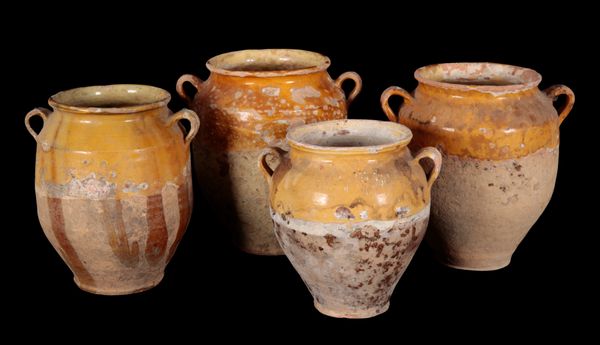 A GROUP OF FOUR TERRACOTTA VASES