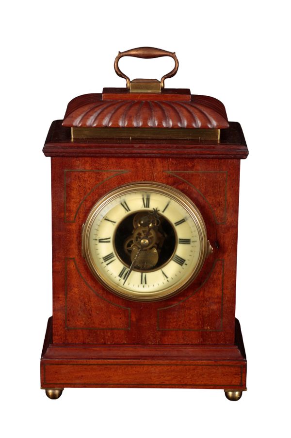 A EUREKA CLOCK CO. MAHOGANY AND BRASS CASED ELECTRIC MANTEL CLOCK