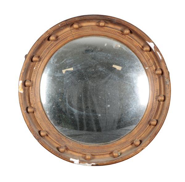 A VICTORIAN GILTWOOD CONVEX MIRROR