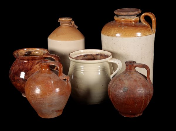 A GROUP OF SIX JUGS AND VESSELS