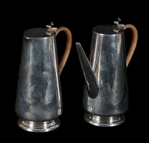 A SILVER COFFEE POT AND HOT WATER JUG