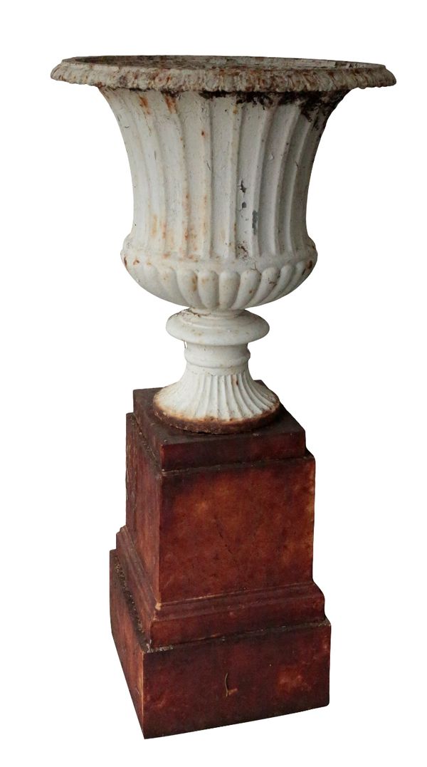 A VICTORIAN WHITE PAINTED CAST IRON CAMPANA URN, ON STEPPED PLINTH