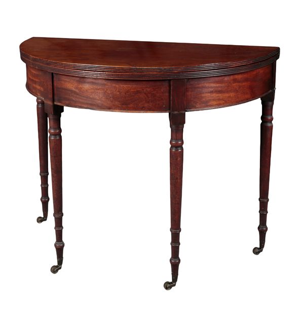 A GEORGE III MAHOGANY SEMI-CIRCULAR TEA TABLE