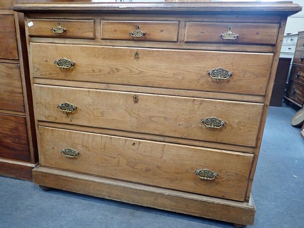 AN OAK CHEST OF DRAWERS,  18TH CENTURY AND LATER