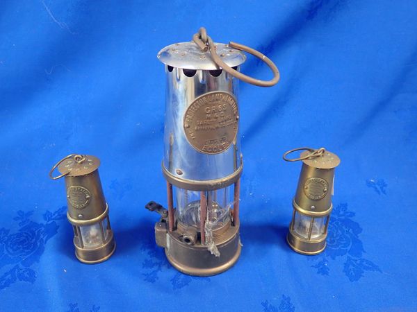 A MINER'S LAMP;  'THE PROTECTOR LAMP AND LIGHTING CO. LTD.'