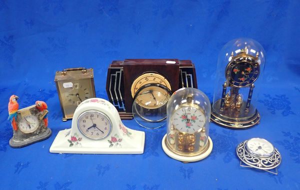 TWO ANNIVERSARY CLOCKS, UNDER GLASS DOMES