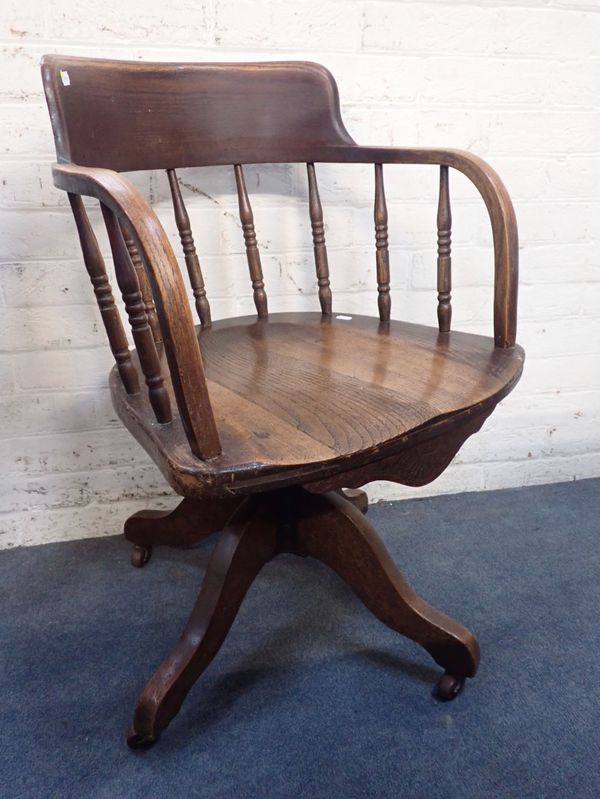 AN EARLY 20TH CENTURY ELM AND ASH OFFICE CHAIR