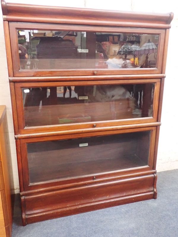 THE GLOBE-WERNICKE CO LTD: A THREE SECTION MAHOGANY BOOKCASE