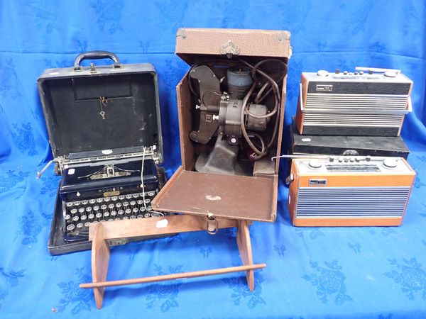 A BELL & HOWELL NO.8 PROJECTOR, A ROYAL TYPEWRITER