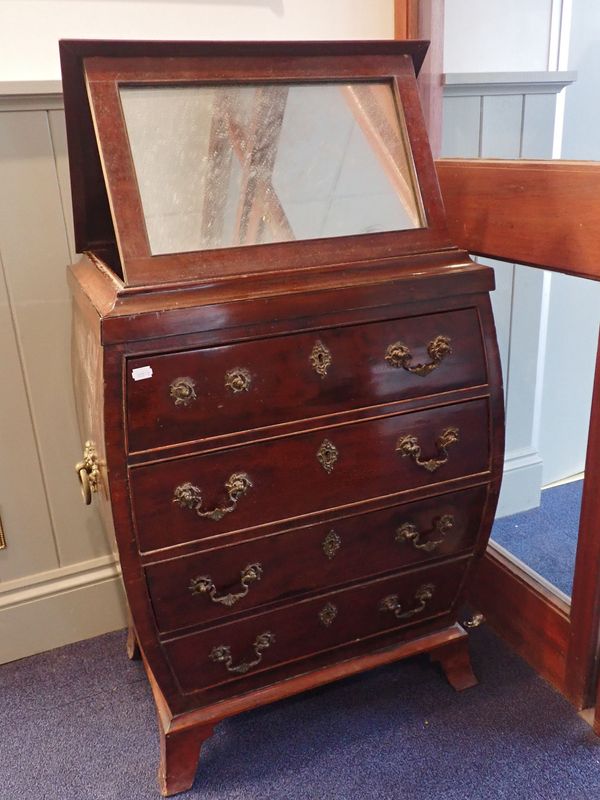 A GEORGE III  STYLE MAHOGANY DRESSING CHEST, OF BOMBE FORM