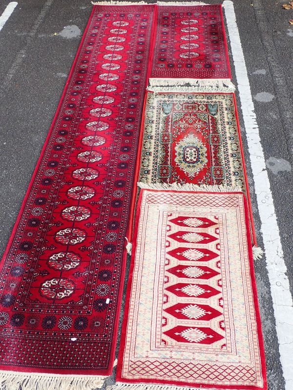 A LONG RED GROUND KESHAN RUNNER