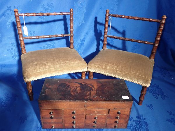 A PAIR OF REGENCY STYLE MINIATURE FAUX-BAMBOO CHAIRS