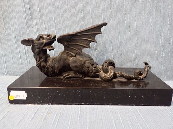 A CAST BRONZE GRYPHON OR DRAGON