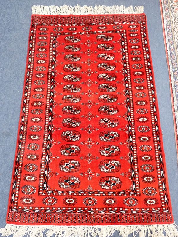 A RED GOUND KESHAN TYPE RUG