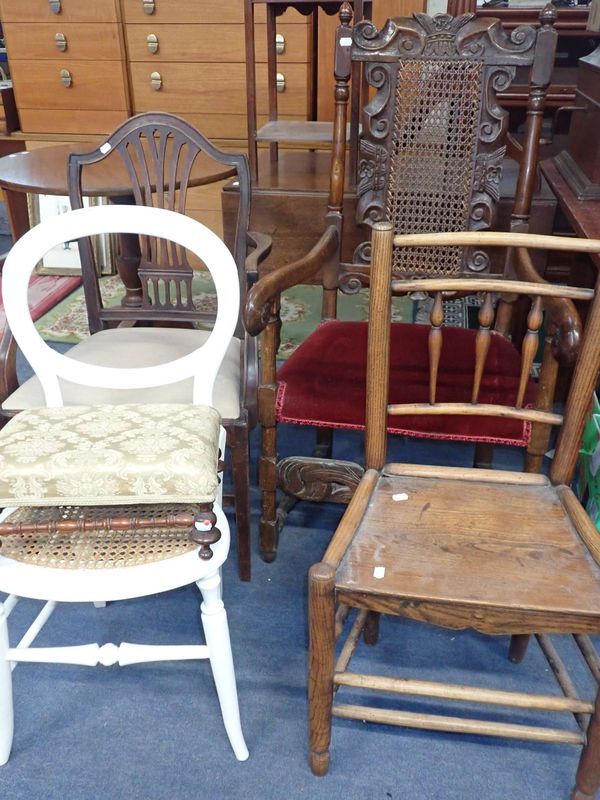 A 'CAROLEAN'  OAK ARMCHAIR