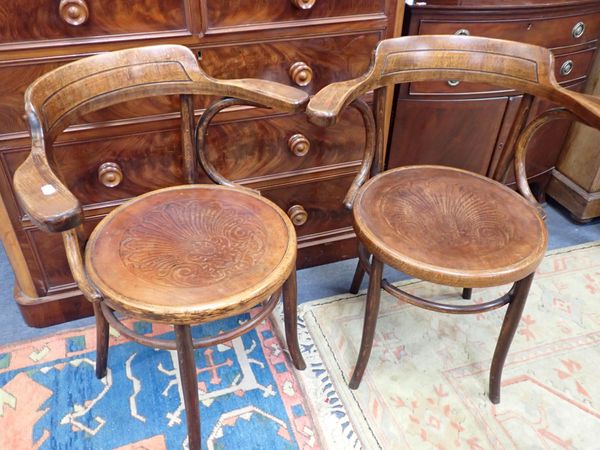 A PAIR OF BENTWOOD ARMCHAIRS, IN THE STYLE OF THONET