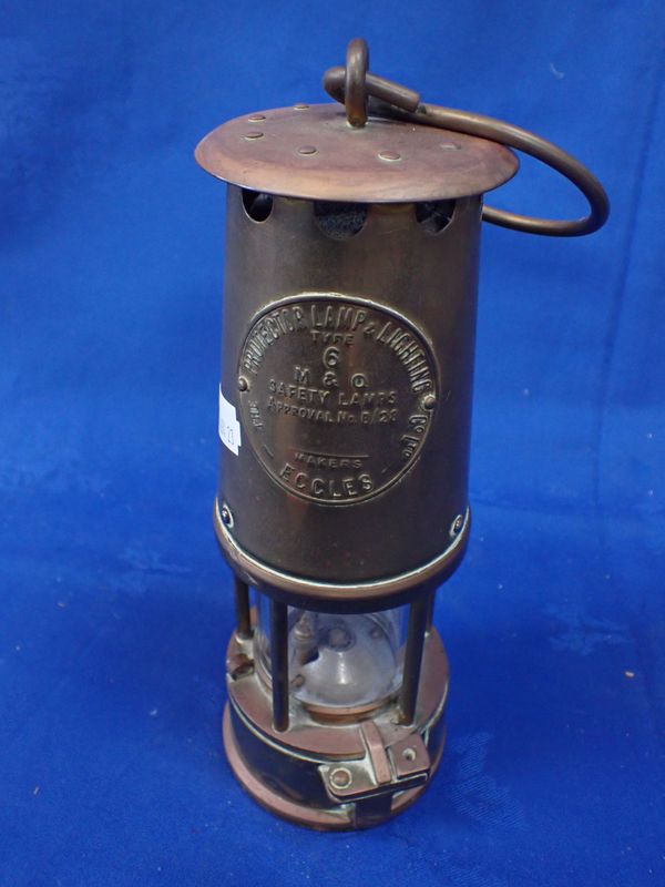 A MINER'S LAMP;  'THE PROTECTOR LAMP AND LIGHTING CO. LTD.'