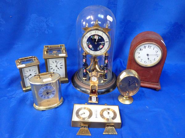 A EDWARDIAN BRASS REPEATING CARRIAGE CLOCK