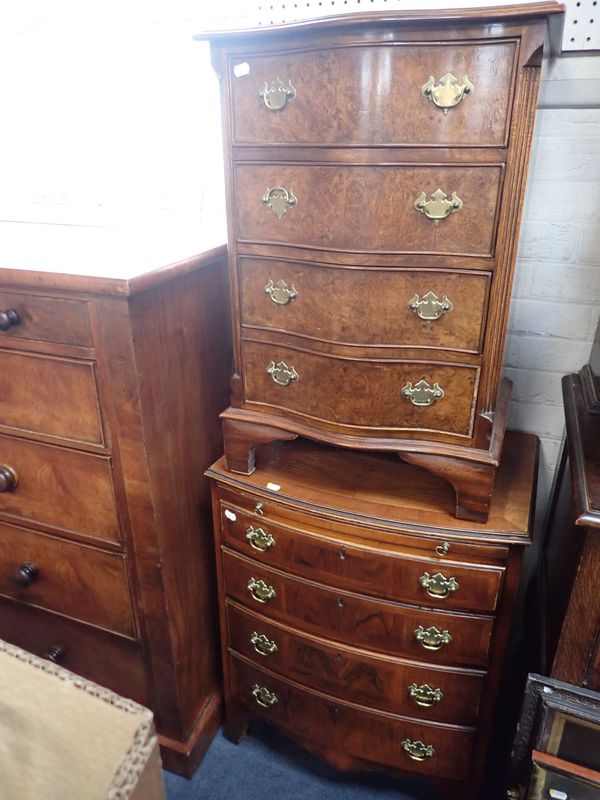 A SMALL BOWFRONT WALNUT CHEST OF DRAWERS, WITH BRUSHING SLIDE