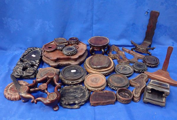 A COLLECTION OF CARVED HARDWOOD STANDS