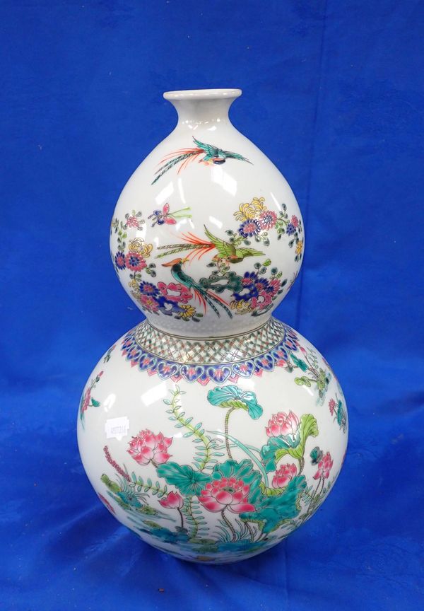 A CHINESE FAMILLE ROSE DOUBLE GOURD VASE