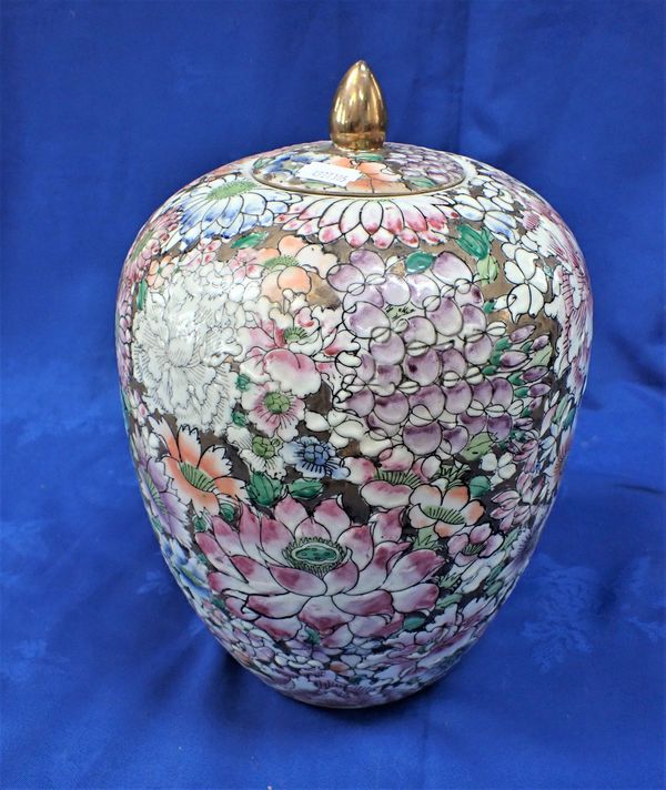 A CHINESE MILLE FLEUR DECORATED VASE AND COVER