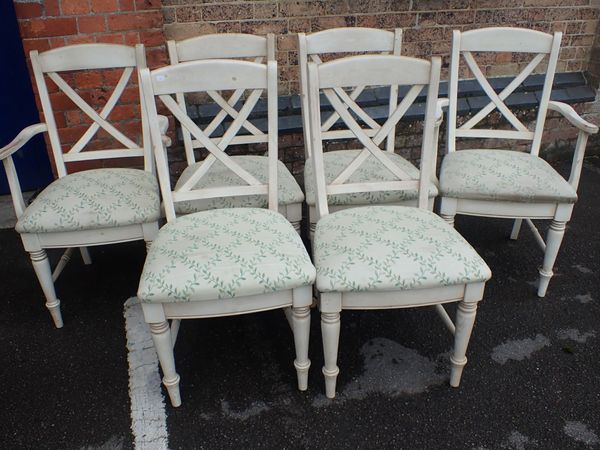 A SET OF SIX DUCAL WHITE PAINTED DINING CHAIRS