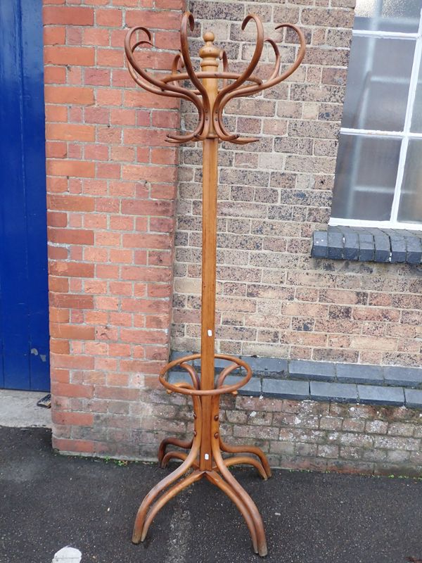 AN EARLY 20TH CENTURY BENTWOOD EIGHT HOOK HAT STAND OF THONET DESIGN