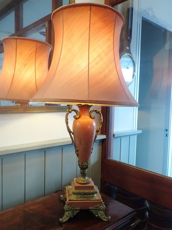 A PINK MARBLE AND ORMOLU MOUNTED TABLE LAMP