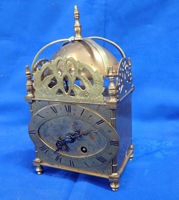 A BRASS 'LANTERN' STYLE CLOCK