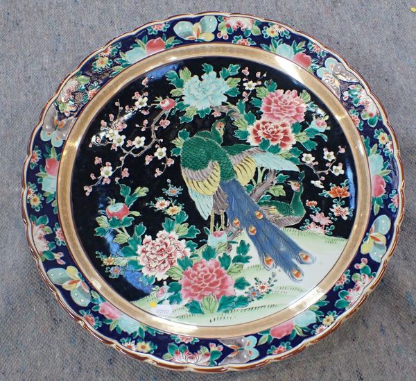 A LARGE CHINESE CHARGER, PAINTED WITH PEACOCKS