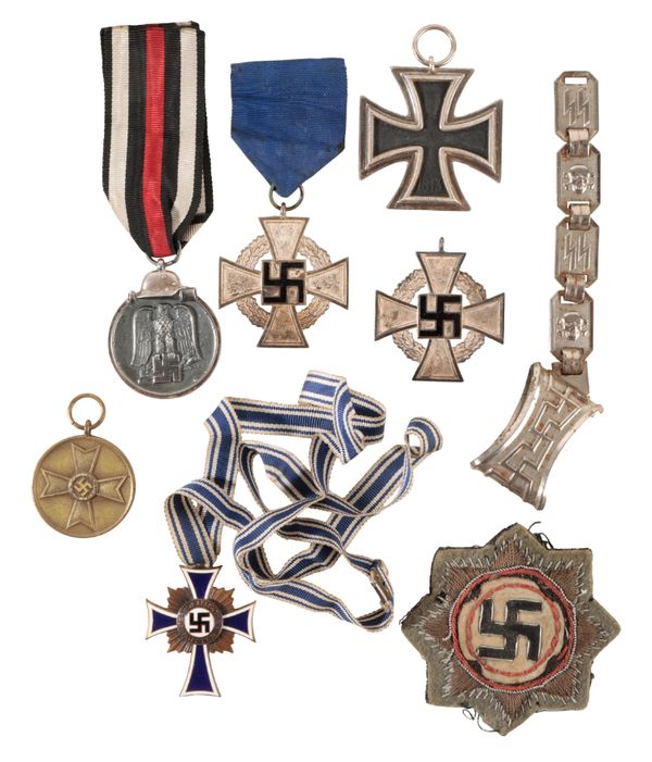 A COLLECTION OF THIRD REICH BADGES AND MEDALS