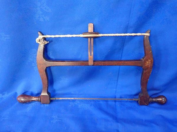 AN ANTIQUE BOW-SAW, STAMPED 'C. A. CHEDZEY'