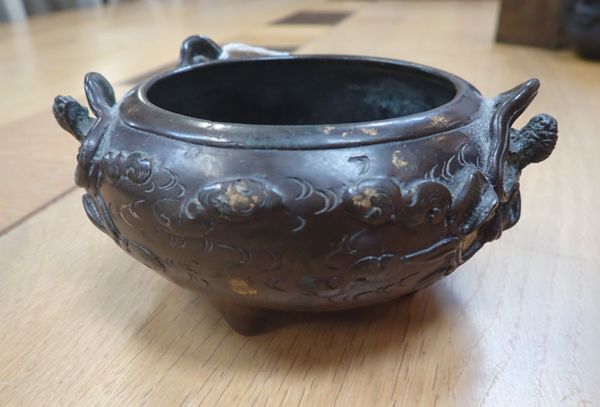 A GOLD SPLASH FOOTED BRONZE CENSER