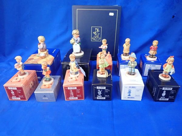 A COLLECTION OF GOEBEL HUMMEL FIGURES (BOXED)