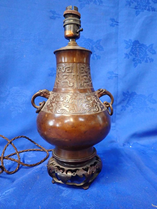 A CHINESE BRONZE TABLE LAMP BASE