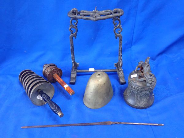 A TIBETAN TEMPLE BELL WITH STAND