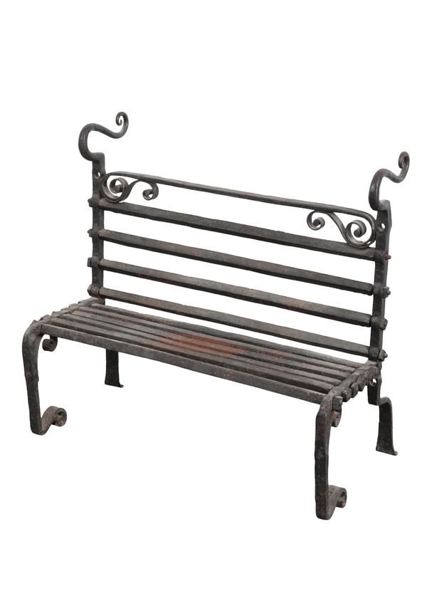 A WROUGHT IRON GRATE