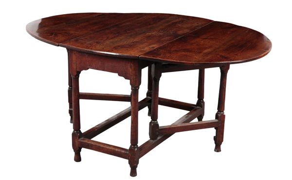 AN 18TH CENTURY OAK OVAL GATELEG TABLE