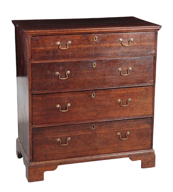 A GEORGE III OAK FACED CHEST OF DRAWERS