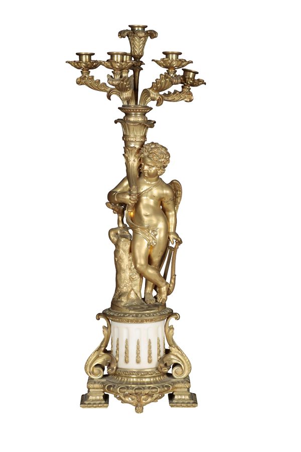 A LOUIS PHILLIPE STYLE GILT METAL FIGURAL CANDELABRA