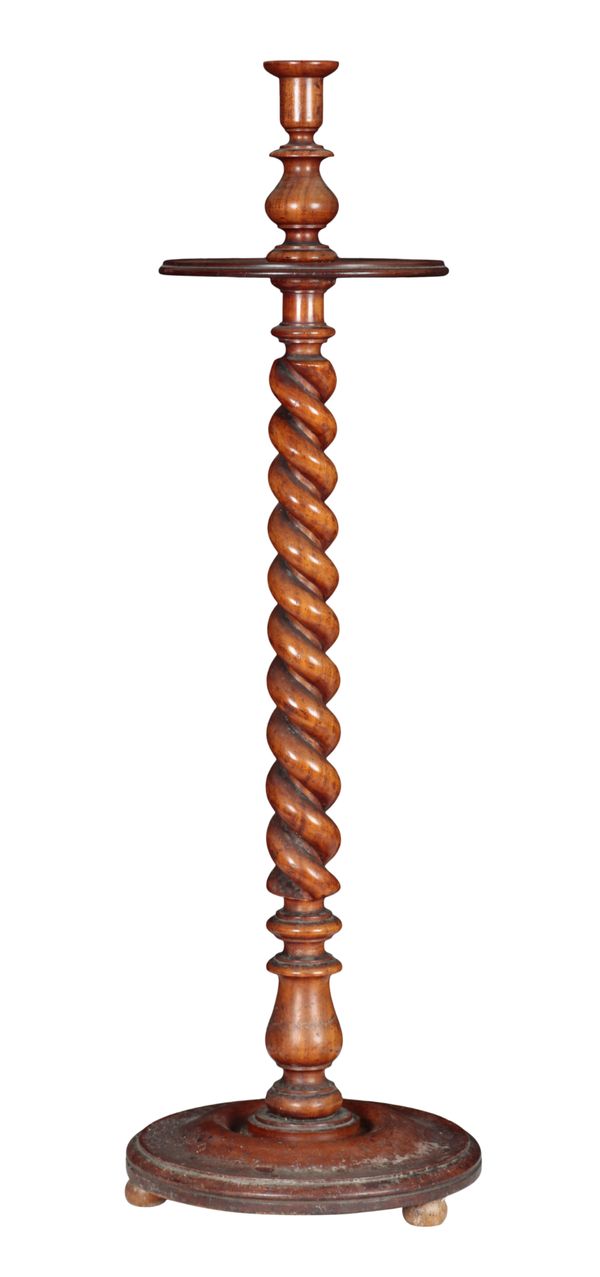 A WALNUT TORCHERE