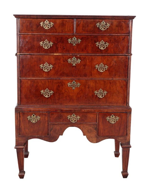 AN 18TH CENTURY FIGURED WALNUT CHEST ON STAND