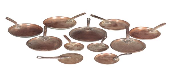 A MIXED GROUP OF ELEVEN COPPER PAN LIDS