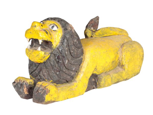 A FOLK ART PAINTED AND CARVED WOOD LION