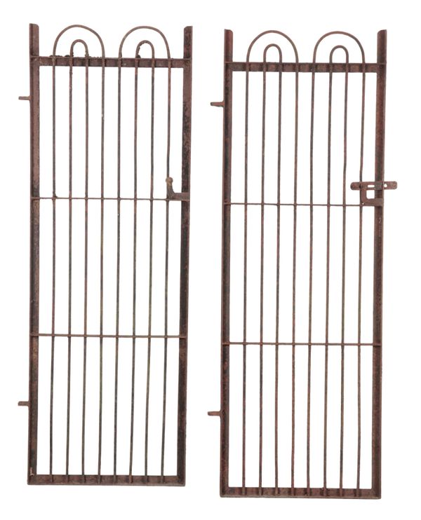 A PAIR OF TALL WROUGHT IRON GATES