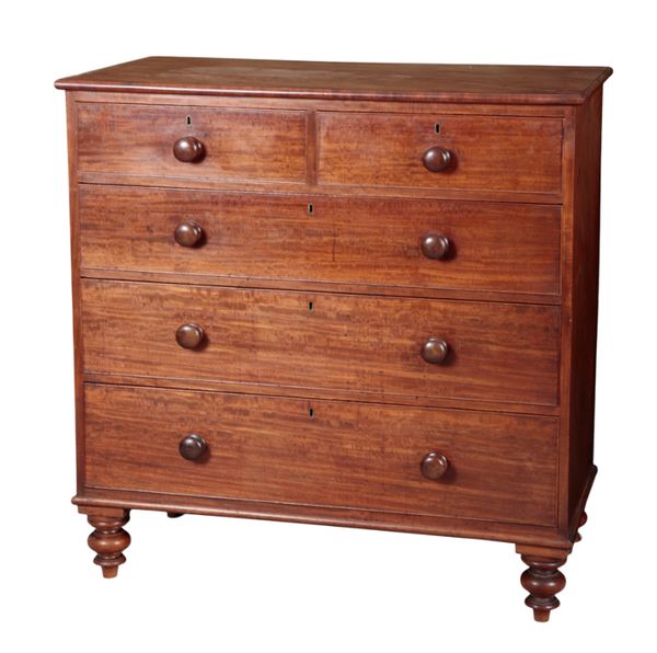 A VICTORIAN FIGURED MAHOGANY CHEST OF DRAWERS