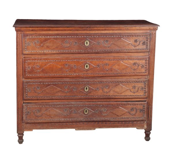 AN 18TH CENTURY FRENCH OAK CHEST OF DRAWERS